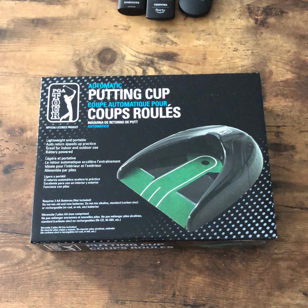 Never opened PGA putting cup